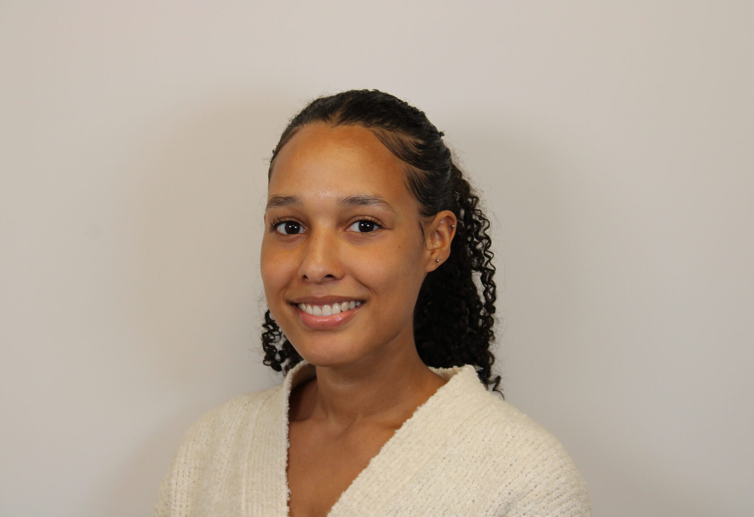 Professional headshot of Jasmin Rufus