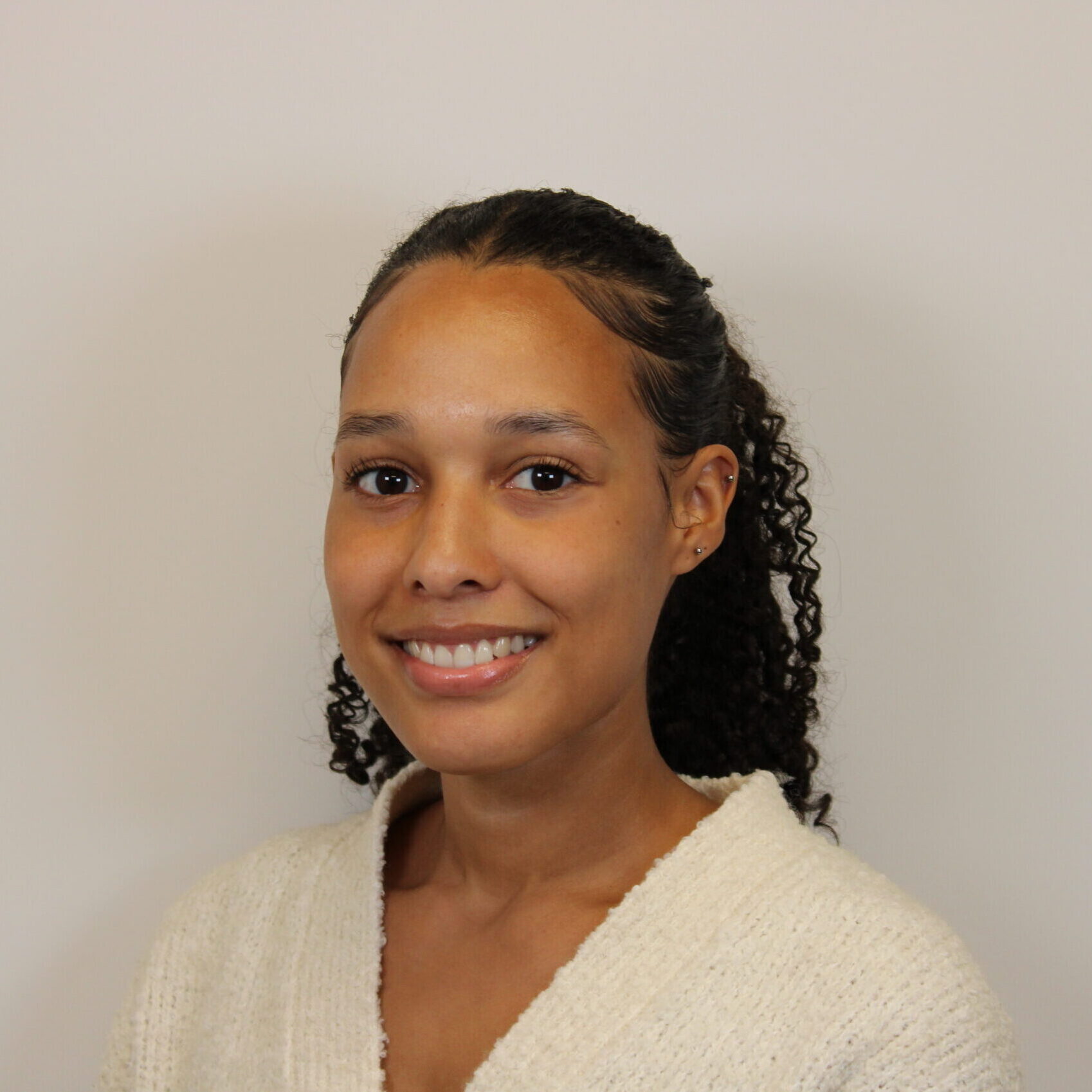 Professional headshot of Jasmin Rufus